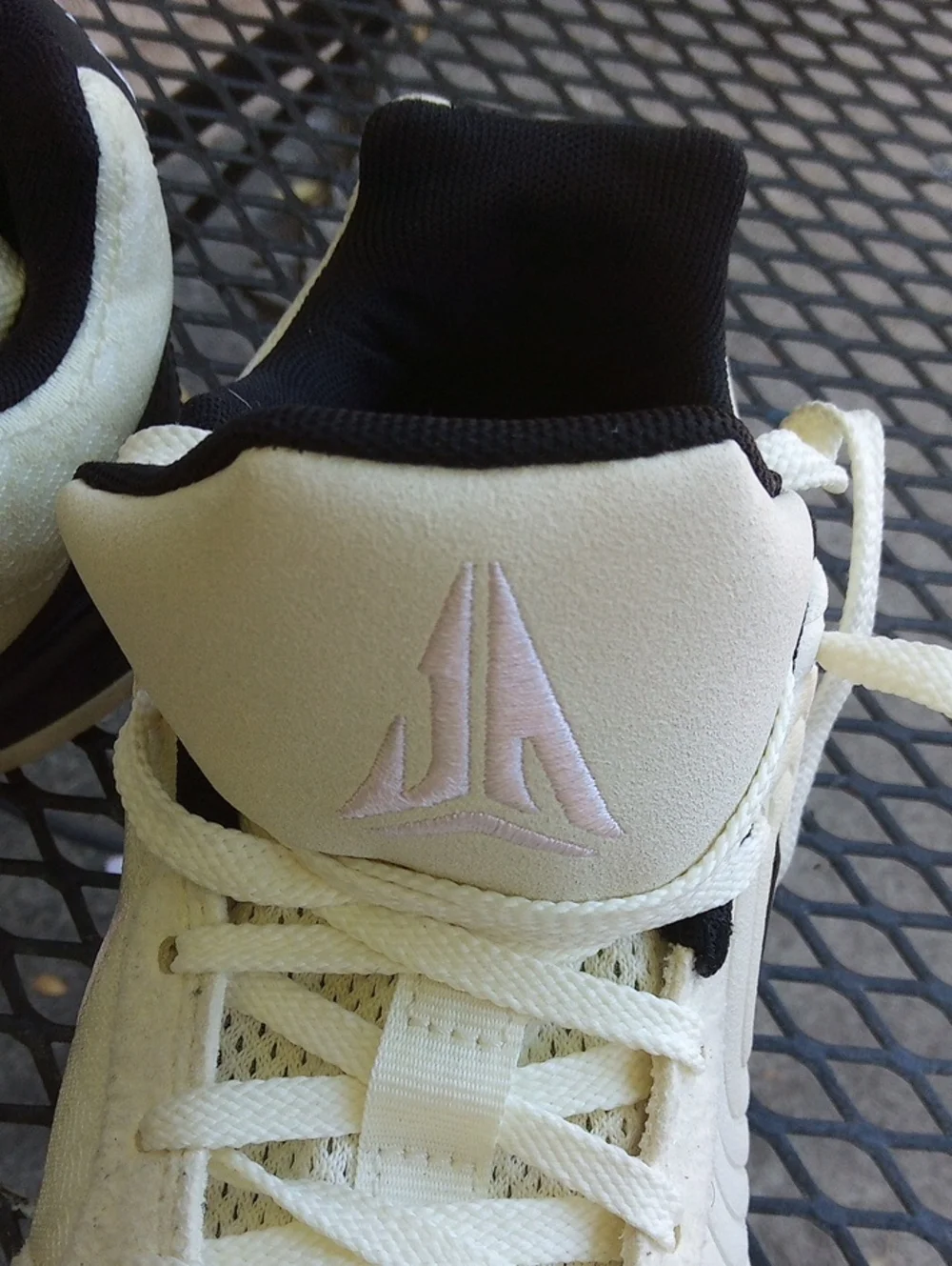 Nike Low-Top Sneakers in Cream and Black